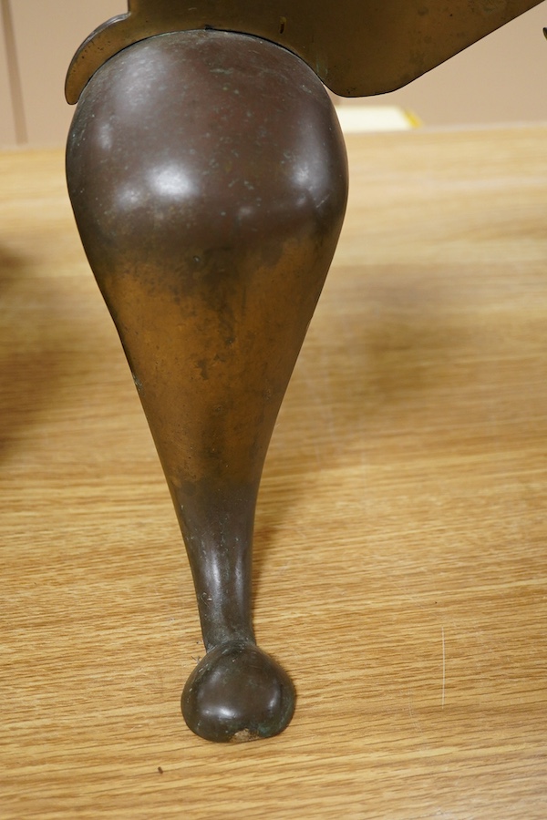A Georgian brass footman, 33cm tall, 42cm wide. Condition - fair to good